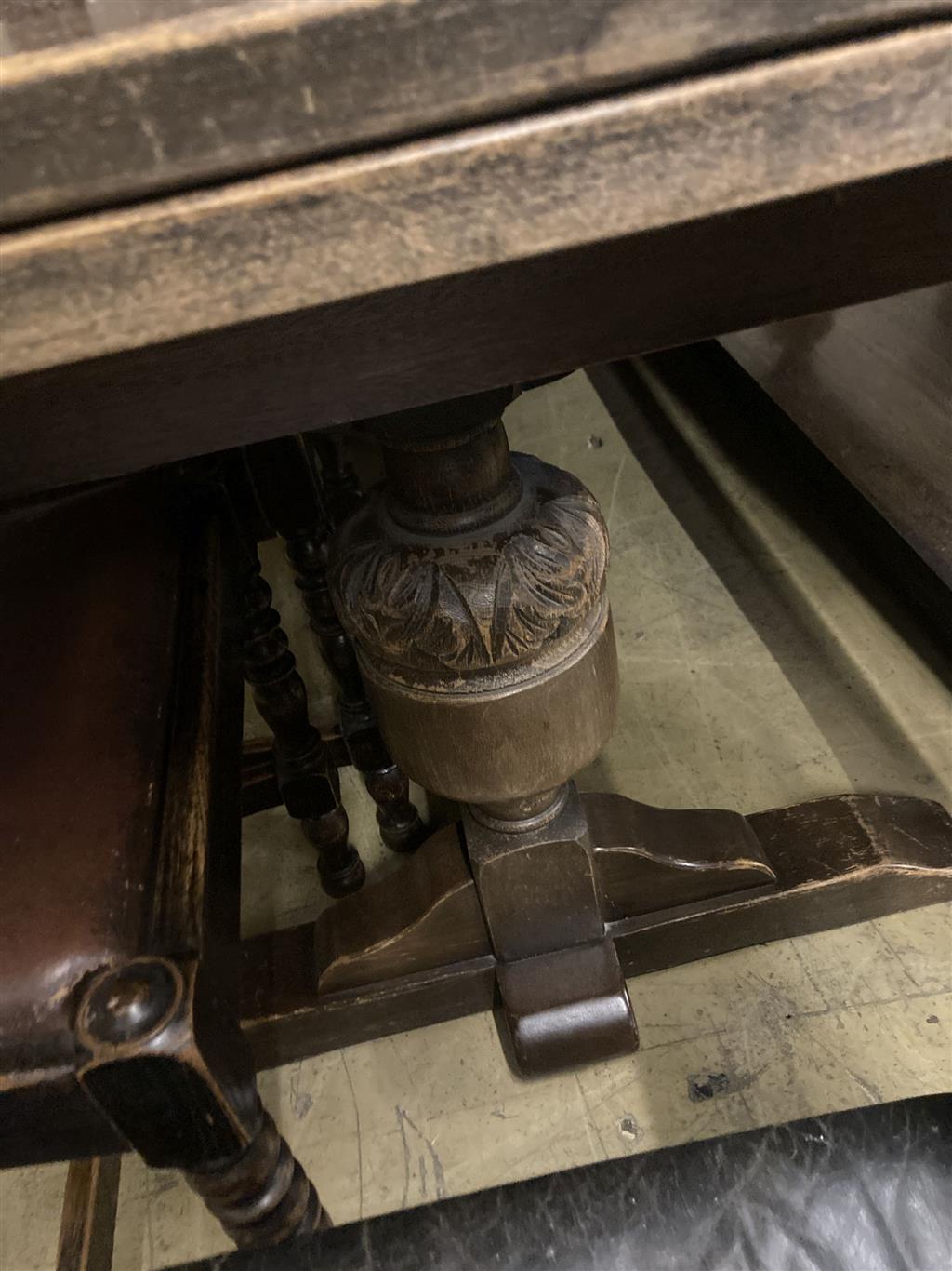 An 18th century design oak draw leaf dining table, 270cm extended width 92cm height 77cm, together with a set of six caned oak dining c